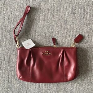 Brand new Coach clutch.